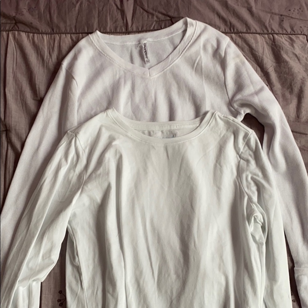 two plain white T-shirts